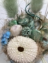 Kép 3/4 - Falatnyi vízparti szösszenet kollekció / Kormánykerekes, tengeri sünös tartós virágdísz 