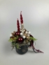 Kép 1/4 - Diótörő figurás, bordó metál csavart gyertyás karácsonyi töltött bögre zuzmó-tuja ágyon, szalagokkal